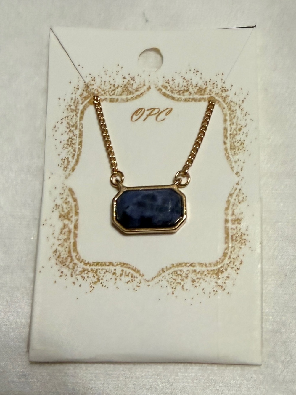 Gold Chain Necklace with Blue Stone Pendant